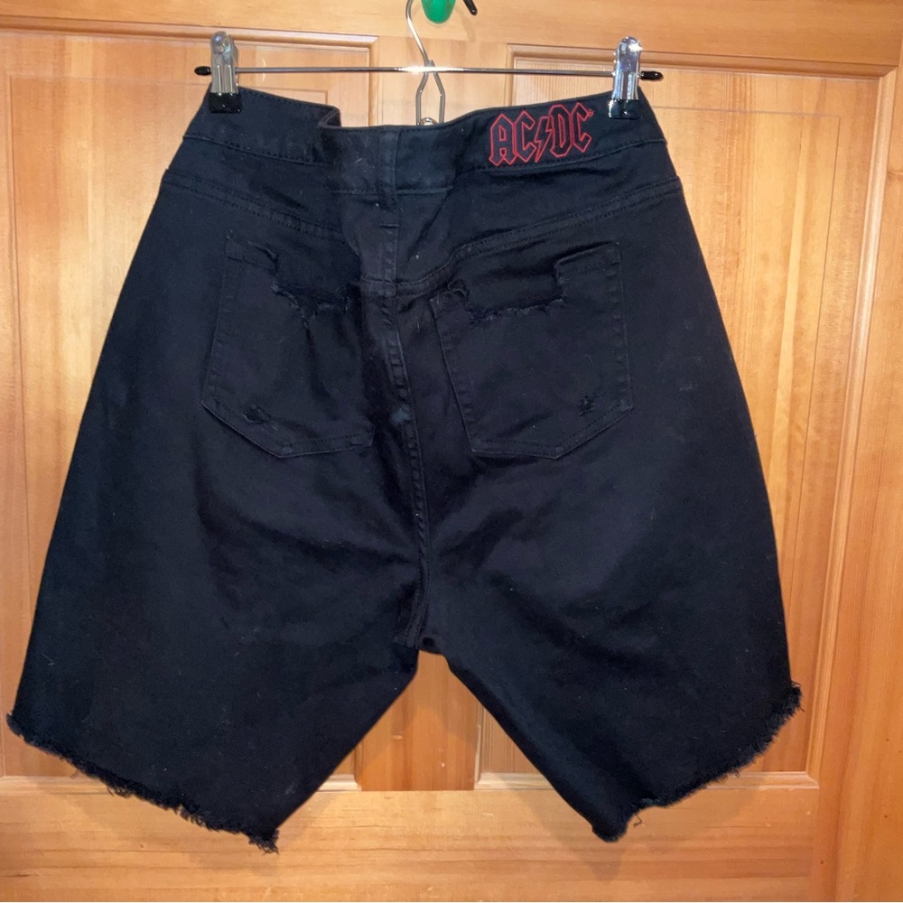 AC/DC distressed black shorts by Torrid.